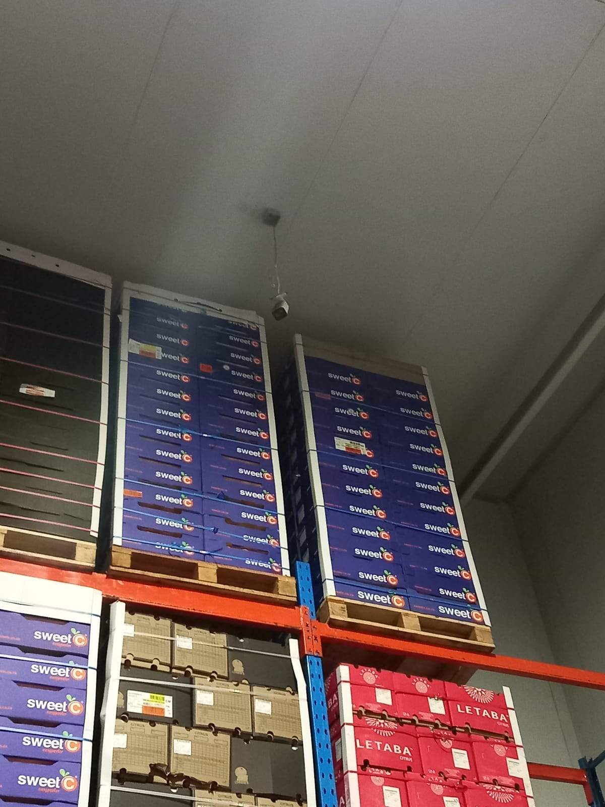 A commercial CCTV camera damaged by forklift impact on a DG Technologies warehouse site