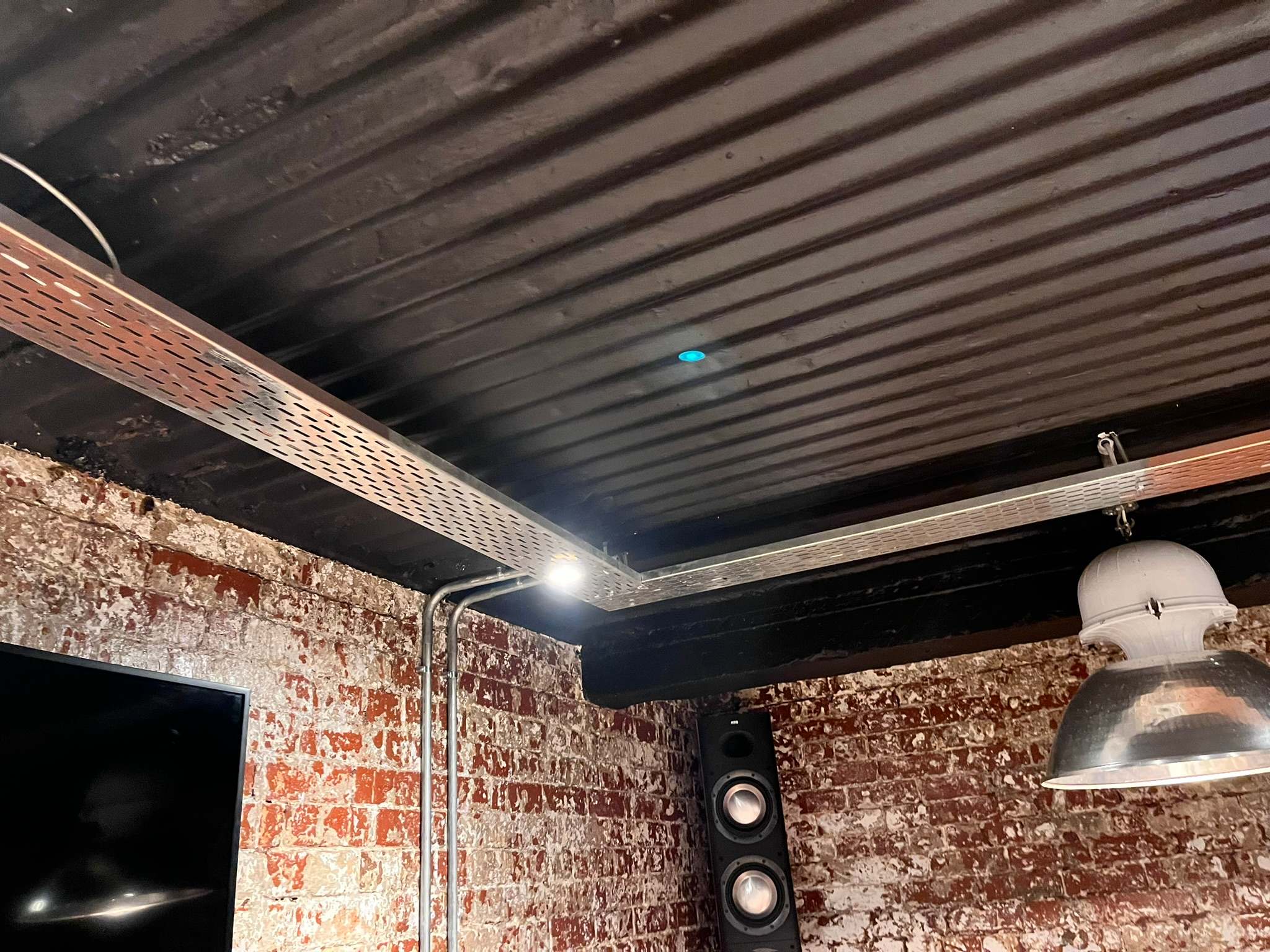 DG Technologies heritage entertainment room build detail: Downlights Integrated Into the Cable Tray