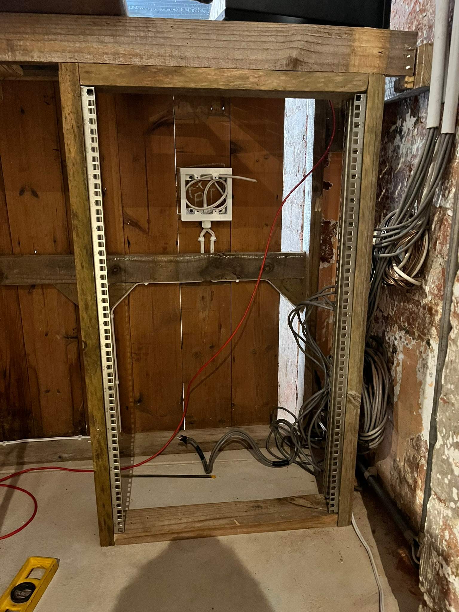 AV equipment rack integrated into custom cabinetry and furniture