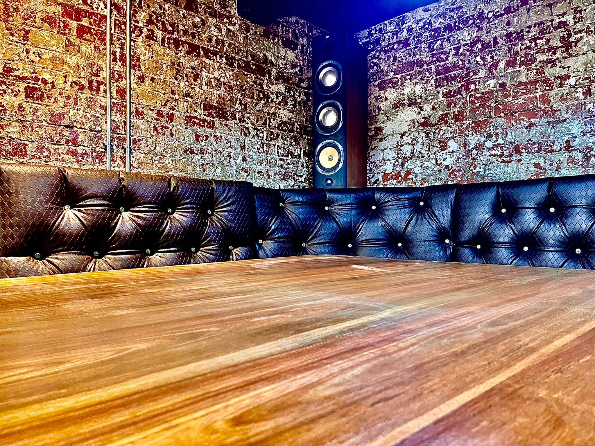 DG Technologies heritage entertainment room build detail: Finished Hardwood Table