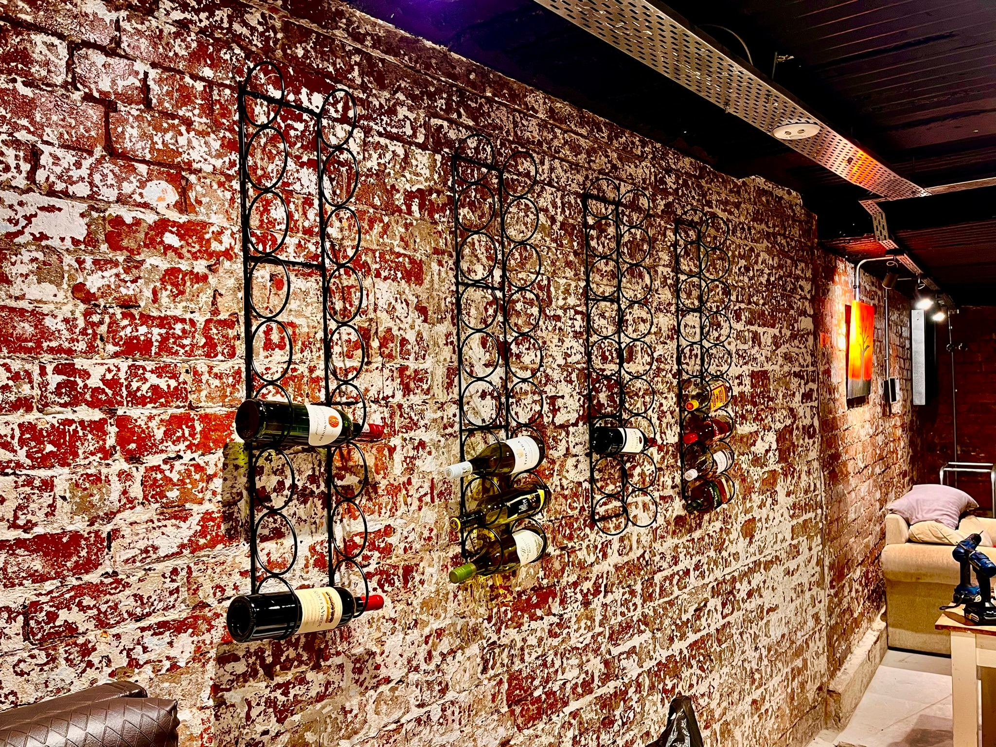 Finished wine racks and restored brickwork in the DG Technologies heritage room