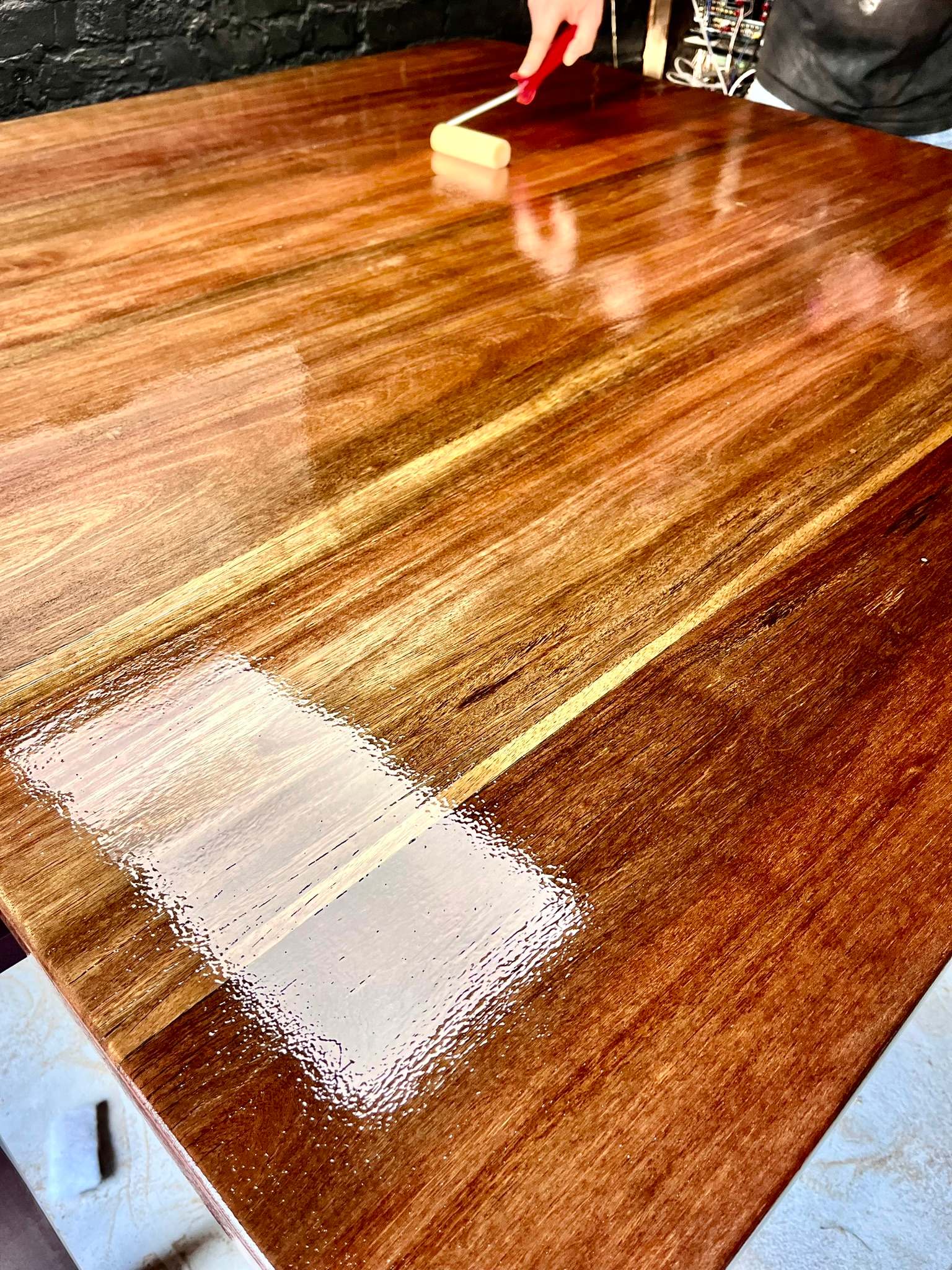 DG Technologies heritage entertainment room build detail: Varnishing the Balau Hardwood Table
