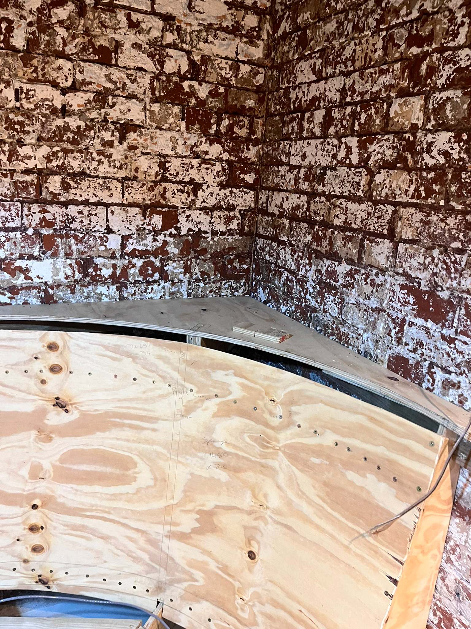 DG Technologies heritage entertainment room build detail: Curved Couch Corner Construction