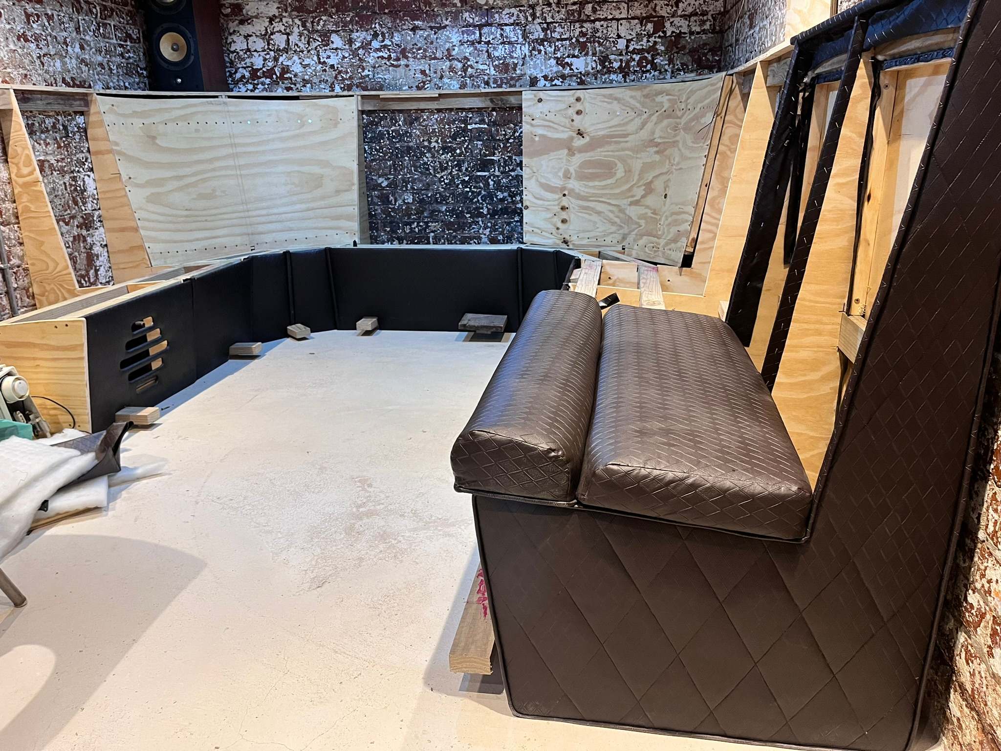 DG Technologies heritage entertainment room build detail: Couch Upholstery Installation