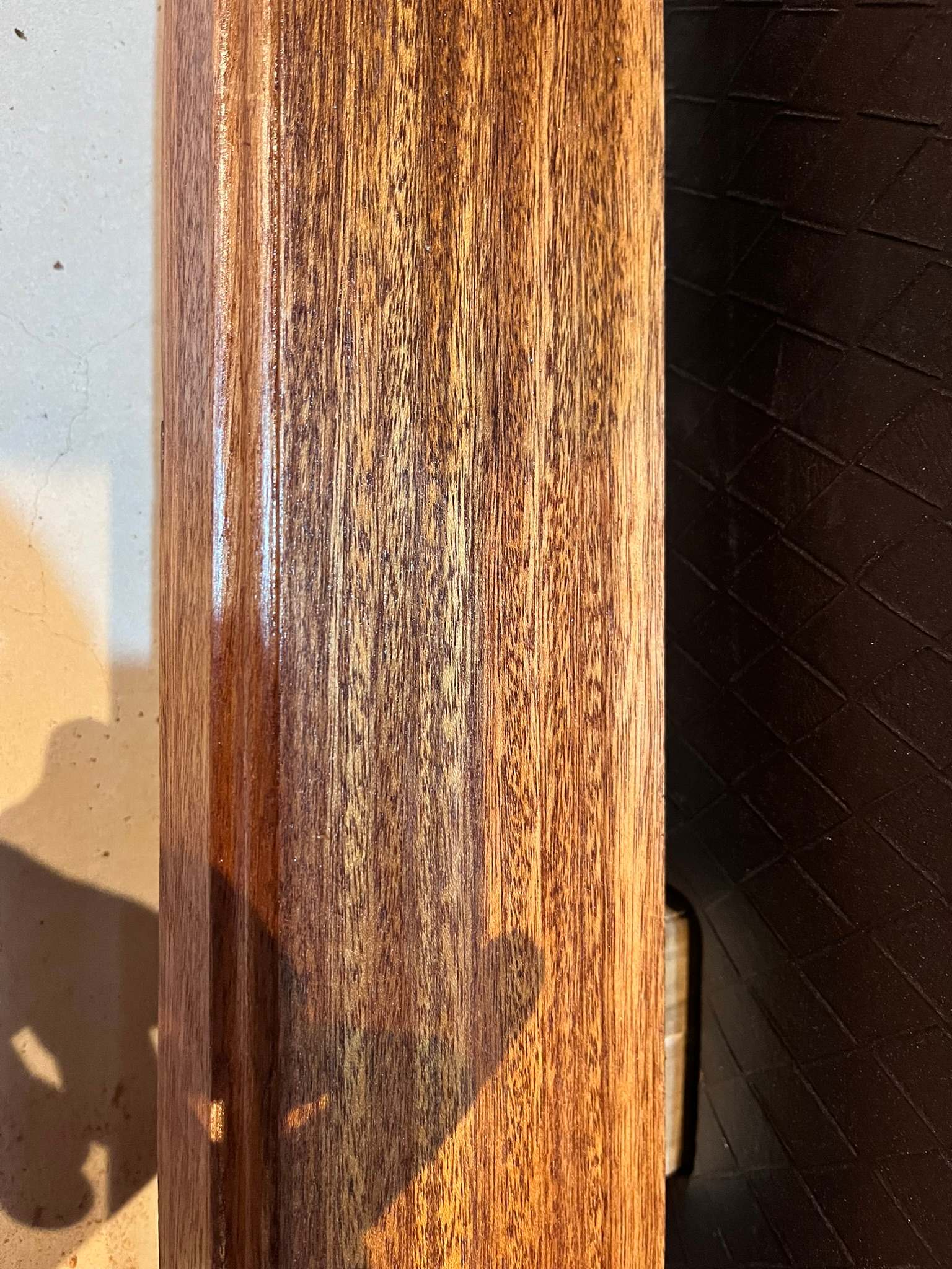 DG Technologies heritage entertainment room build detail: Varnished Balau Footrest Timber