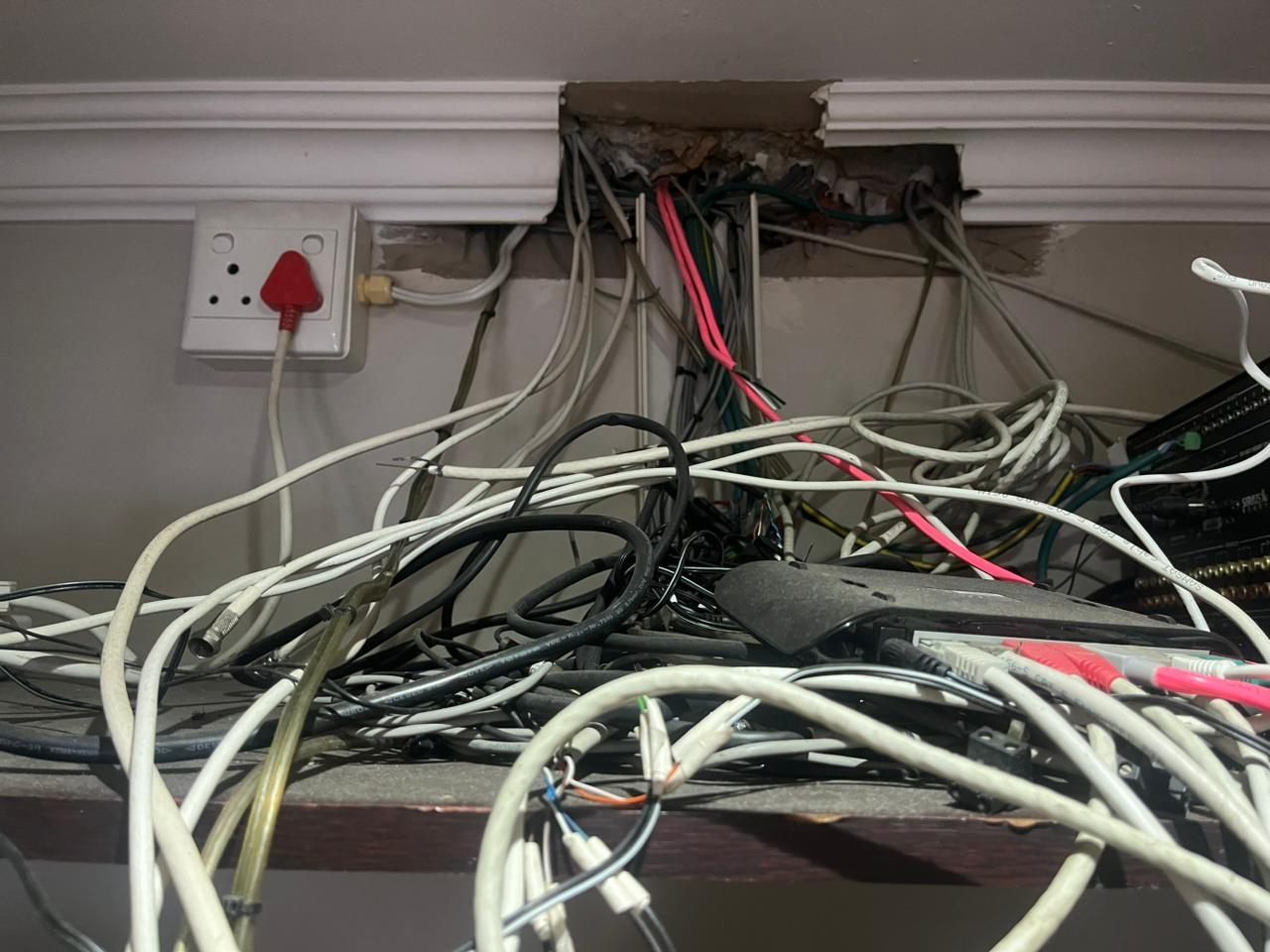 Low-voltage smart home and AV cabling before professional cleanup and documentation
