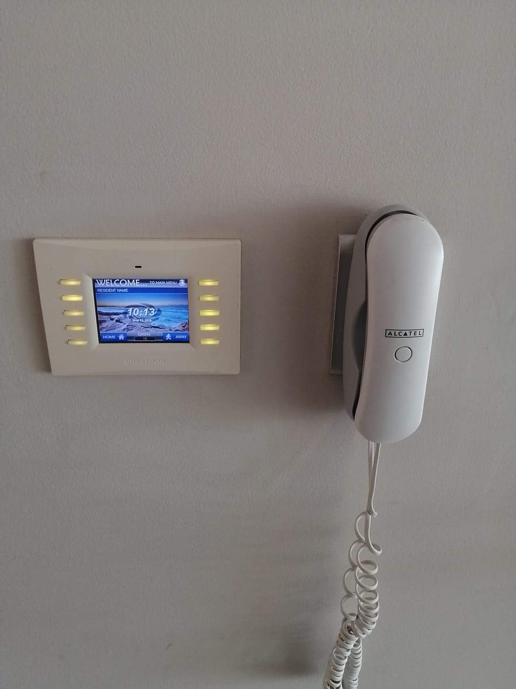 Original Crestron wall touch panel installed at The Pearls of Umhlanga