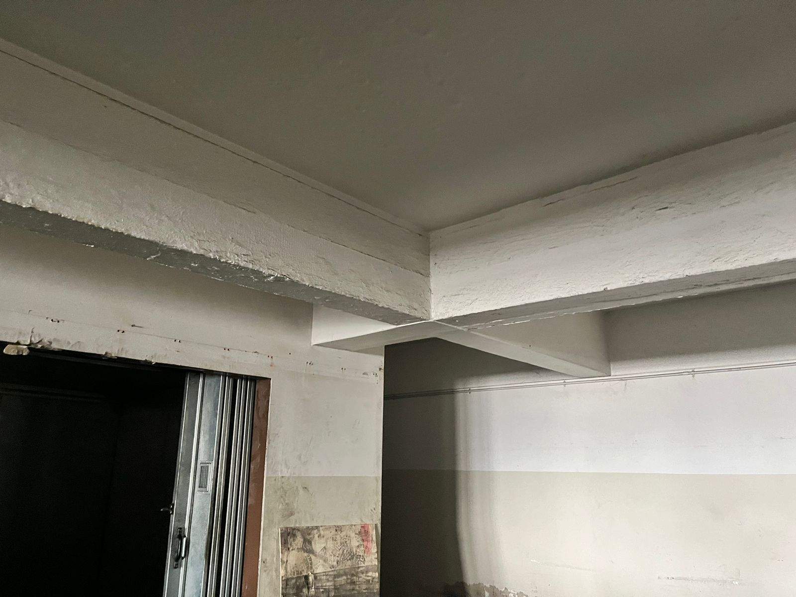 Retrofit commercial CCTV cabling route around concrete beams