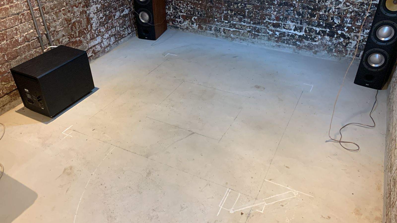 Early speaker positioning and cabling planning before a cinema room is finished