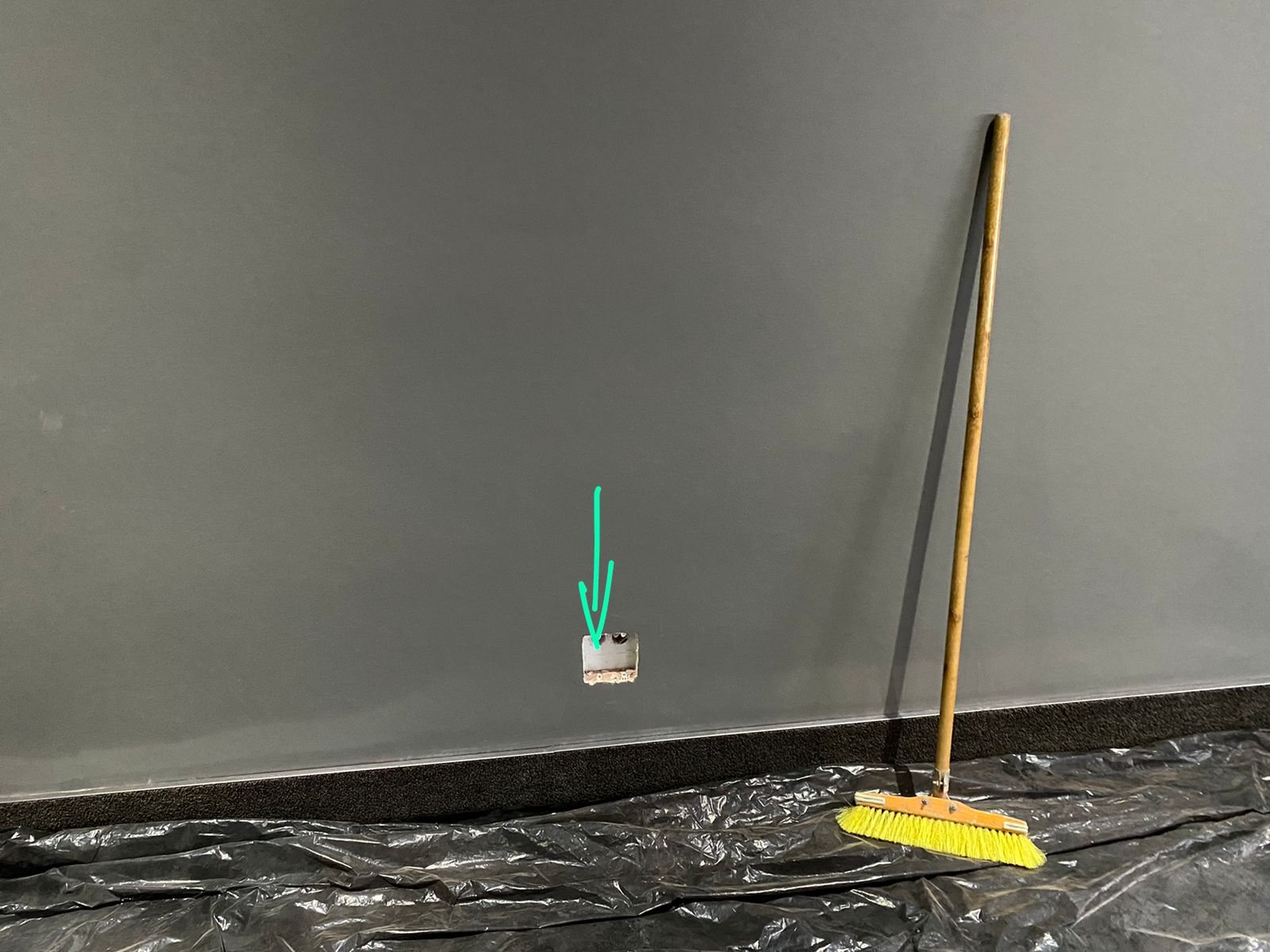 Recessed wall box positioned for flush cinema cabinetry and AV cabling