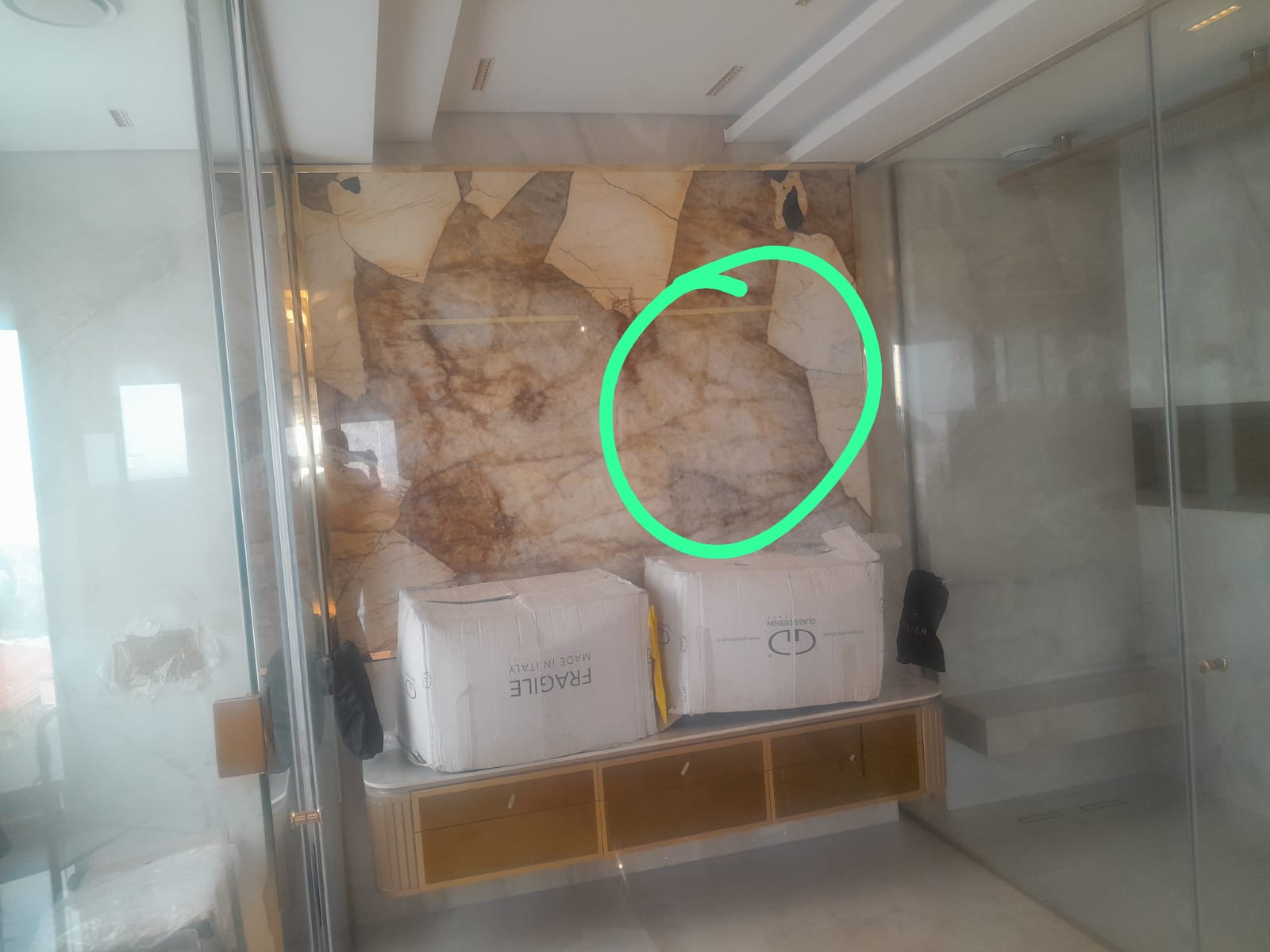 Lighting detail being planned behind a marble finish