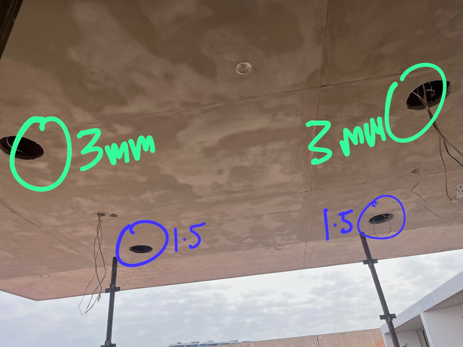 sibaya house mounting speakers in a concrete slab